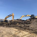 แบคโฮ cat วางท่อ